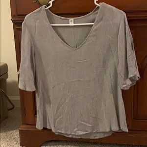 Woman’s short sleeve shirt. Size XS. Gently used